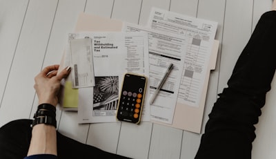Calculator and paperwork